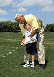 Arnold Palmer and a child