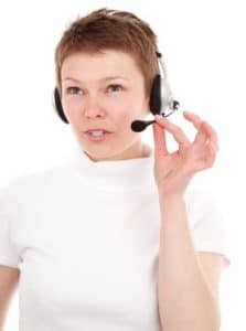 boiler room scams use high-pressure sales tactics. On the photo - telemarketing agent
