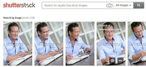 Shutterstock images with a business man with glasses